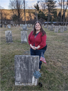 State Regent Amanda Lazarus marking the grave of Daniel Martin in Vermont